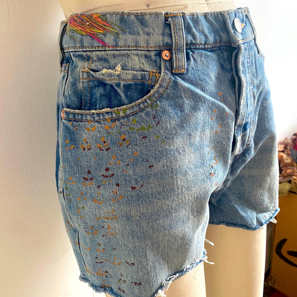 Free people we the free denim shorts with paint and stitching details size 27?